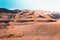 Colored mountains under the blue sky. Red hills of Kyzyl-Chin, Altai