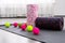 Colored Myofascial release massage balls, roll and other body roll recover on gray mat