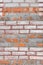 Colored old painted brickwork vertical wall texture background