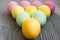 Colored painted eggs on a gray table. Easter celebrating