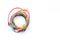 Colored patch-cord in round shape on white background top view copyspace