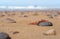 Colored Pebble Beach Texture Background, Sand and Rocky Shore Pattern, Red Morocco Beach, Africa