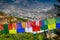 Colored prayer flags overlooking the city