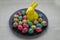 Colored quail eggs on a plate