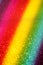 Colored rainbow stripes with shiny glitters. Abstract wallpaper background