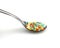 Colored rice on spoon