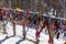 Colored ritual ribbons tied on the tree and wooden poles as a buddhist tradition on Baikal lake