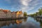 Colored romantic houses by the canal in the historic city center of Brugge