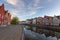 Colored romantic houses by the canal in the historic city center of Brugge