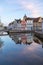 Colored romantic houses by the canal in the historic city center of Brugge