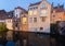 Colored romantic houses by the canal in the historic city center of Brugge