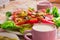 Colored salad and french fries with Pickled Cucumber and cups