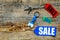 Colored sale labels and house keys on wooden background top view copyspace