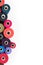 Colored sewing thread coils and on a white background, sewing supplies, text ready, banner, book or magazine cover