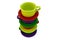 Colored stacked coffee cups on white