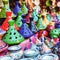 Colored Tajine, plates and pots out of clay on the market in Mor