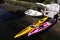 Colored tethered boats for solo navigation on the canals at Vanessa in Los Angeles