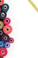 Colored thread coils and yellow tape on a white background, sewing supplies, text ready, banner, book or magazine cover