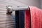 colored towels hanging on the rack in the bathroom, blue and pink, couple, family concept