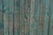 Colored wood texture from old gray blue shabby planks