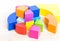 Colored wooden blocks, cubes, build on a light wooden background