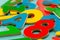 Colored wooden numbers and letters for children