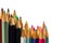 Colored wooden sharpened pencils for office and school on a white background