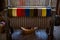 Colored woolen threads on an old loom, Traditional Yarn in Canada.