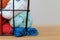 Colored Yarn in metal basket closeup