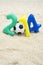 Colorful 2014 Message with Soccer Ball Football on Beach