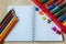 Colorful abacus , pencils, clock, chalkboard on the wooden background. Education, back to school