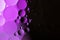 Colorful abstract background. Purple circles and oil bubbles in the water. Close up. Macro abstraction. Rainbow oil pattern and