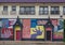 Colorful abstract murals on the side of a building in the Bishop Arts District in Dallas, Texas.