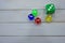 Colorful acrylic dice die light wooden rustic surface