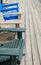 Colorful Adirondack deck and beach chairs in bright blue beige a