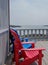 Colorful Adirondack deck and beach chairs in bright red and brig