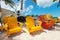 Colorful adirondack lounge chairs at Caribbean beach