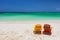 Colorful adirondack lounge chairs at Caribbean beach