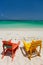 Colorful adirondack lounge chairs at Caribbean beach