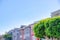 Colorful adjacent residential buildings with paned windows at San Francisco, CA