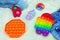 Colorful antistress sensory toys fidget push Pop it, Simple Dimple, and Snapperz.