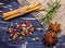 Colorful aromatic Indian spices and herbs on an old oak wooden deep blue board