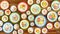 Colorful asian style plates on wooden wall texture background, i