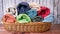 Colorful assortment of folded clothes neatly arranged in a wicker basket