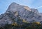 Colorful autumn evening alpine rock scene