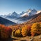 Colorful autumn landscape in the Caucasus mountains. Sunny morning scene with mountain Ushba on the background.