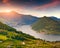 Colorful autumn morning oÑ‚ the Lake Iseo. Italy, Alps.