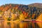 Colorful autumn mountain landscape with reflection in the water