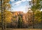 Colorful autumn scenery with trees down the walley