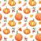 Colorful autumn seamless pattern. Watercolor hand painted pumkins, orange, red and yellow leaves and berries on white background